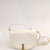 Ted Baker Sohho Leather Padlock Saddle Bag | Ivory